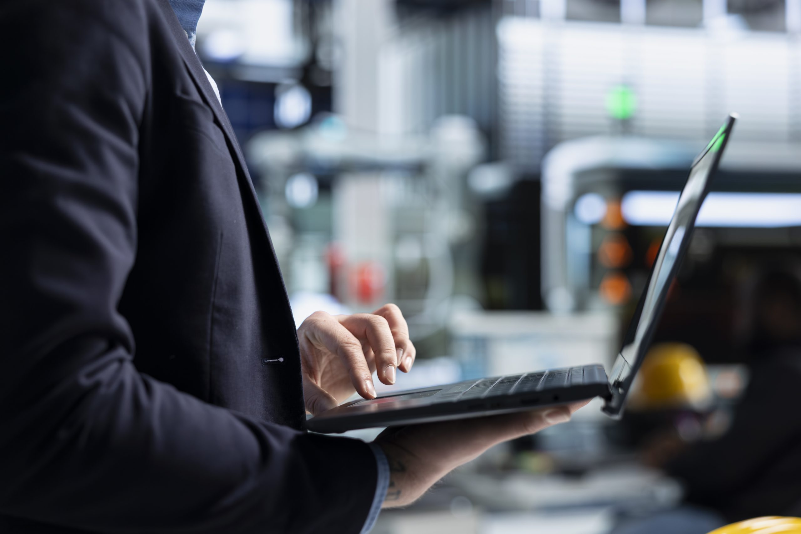 industrial business analyst suit inspecting renewable energy equipment
